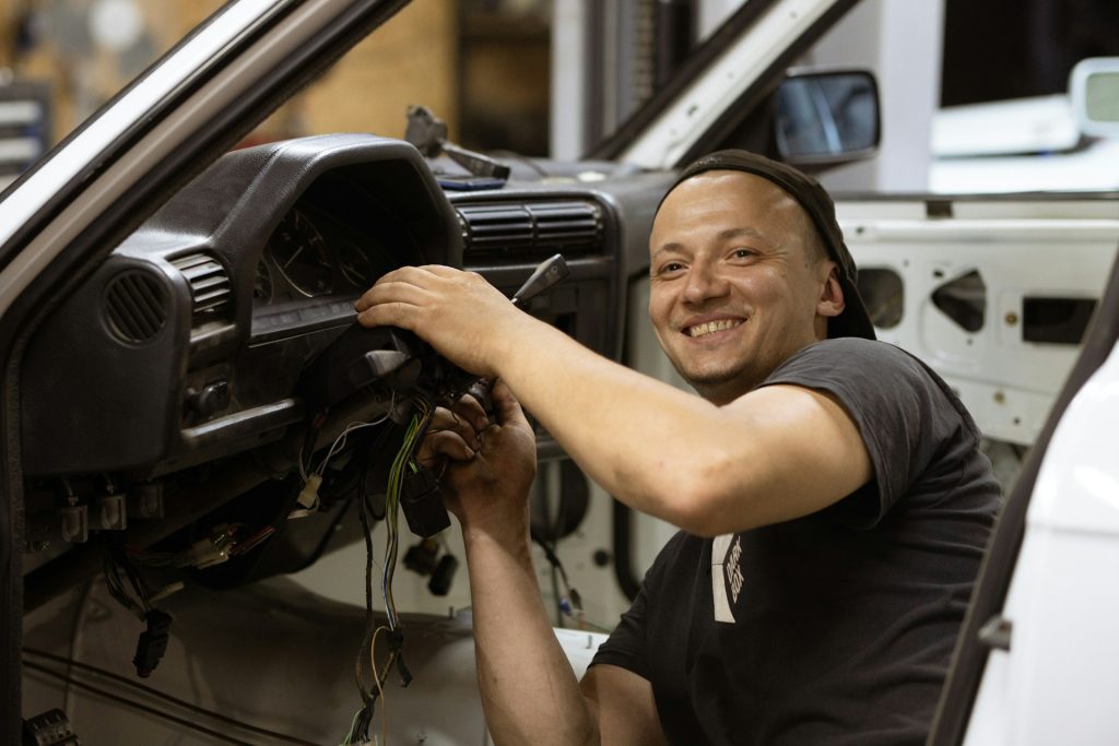Professional technician smiling and satisfying customers